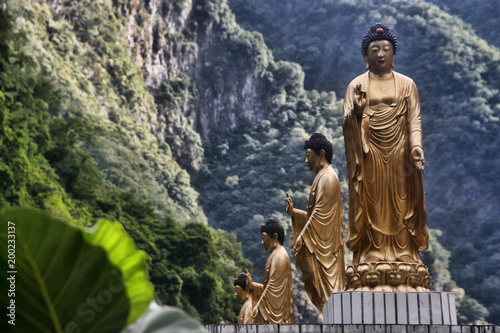 Large gilded statues in Taroko Gorge, Taiwan