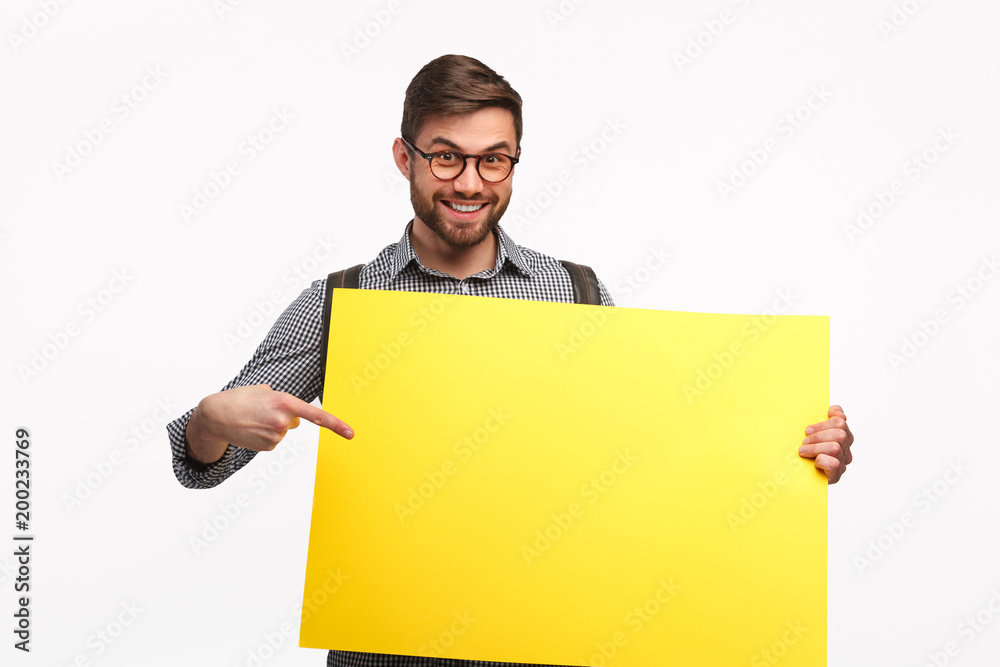 Smiling man with yellow banner Smiling man with yellow banner