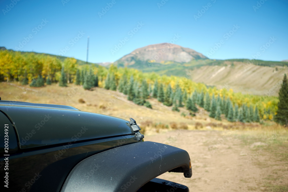Front fender of a black jeep off road in Colorado