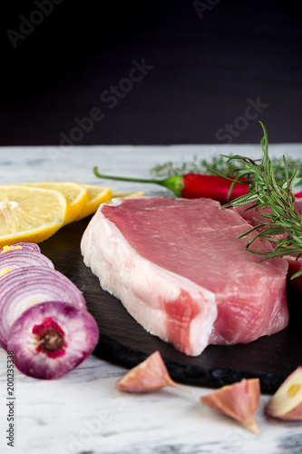 Raw pork meat with spice ingredient