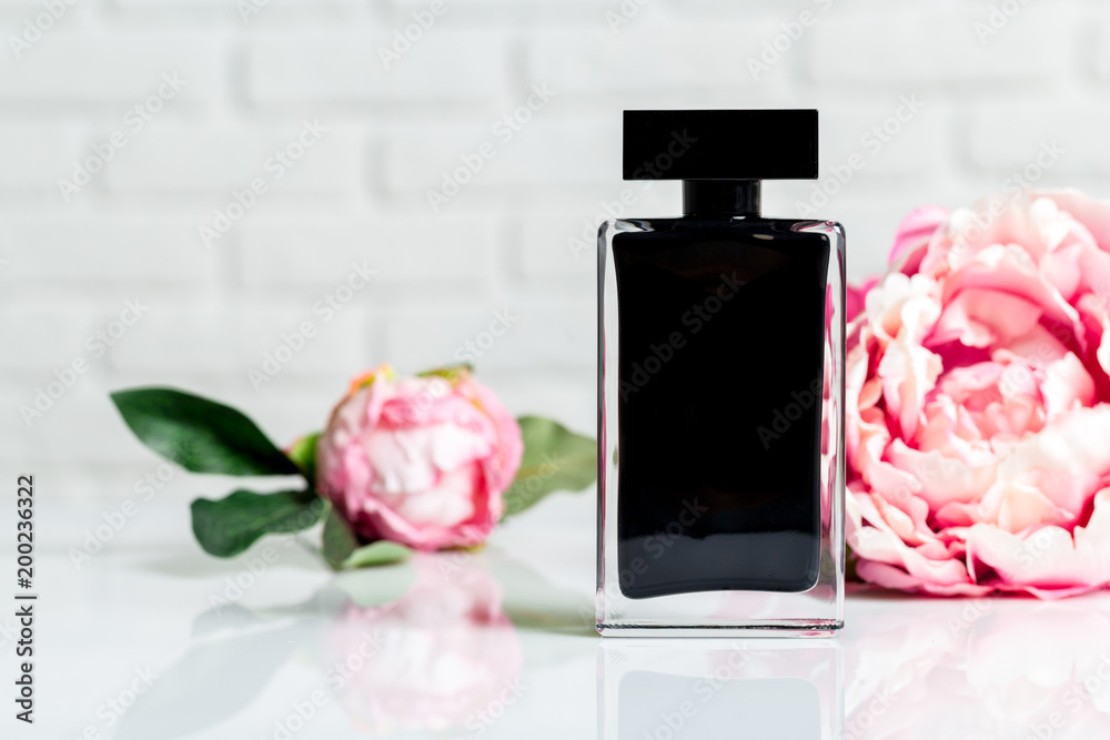 Perfume bottles with flowers Perfume bottles with flowers