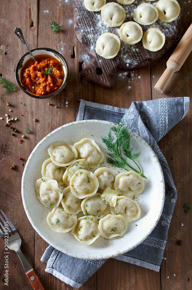 Dumplings with meat, spiced with pepper and dill Dumplings with meat, spiced with pepper and dill