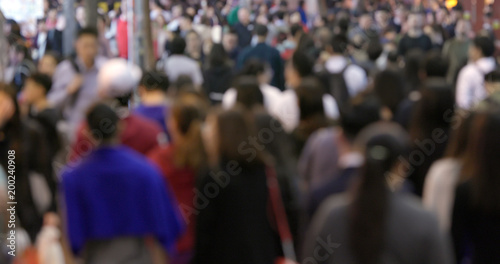 Blur of Crowded of people walk in the street at night