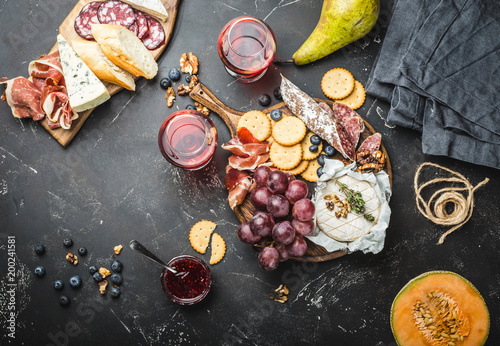 Delicatessen plate and wine