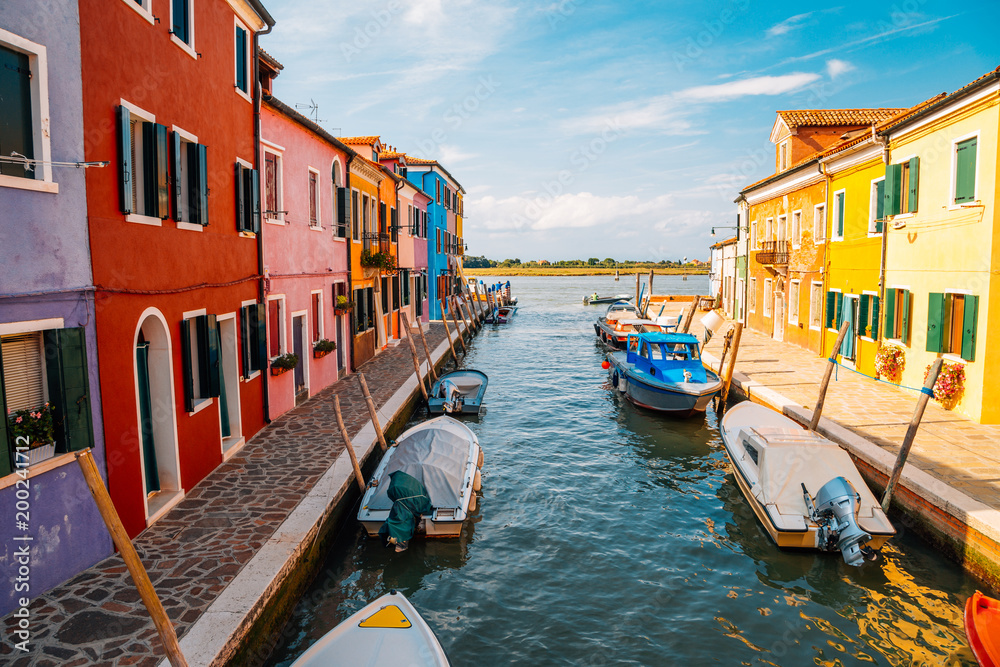 Colorful buildings and canal in Burano island, Venice, Italy