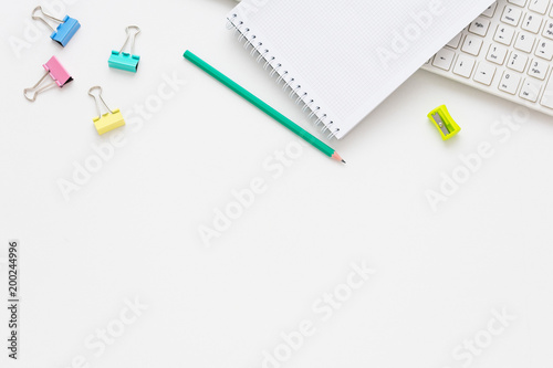 Desk, notebook, office supplies, white background with copy space, for advertisement, top view