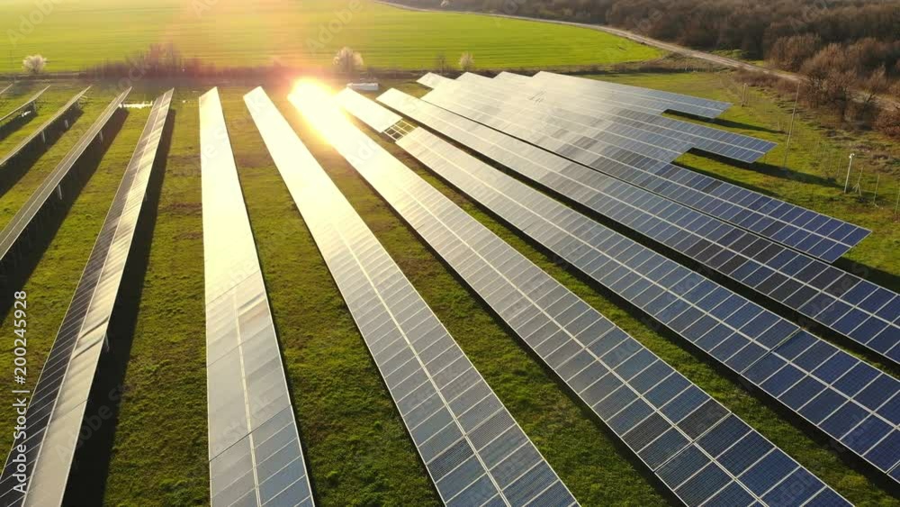Aerial view industrial Photovoltaic solar units panels environment producing renewable green energy