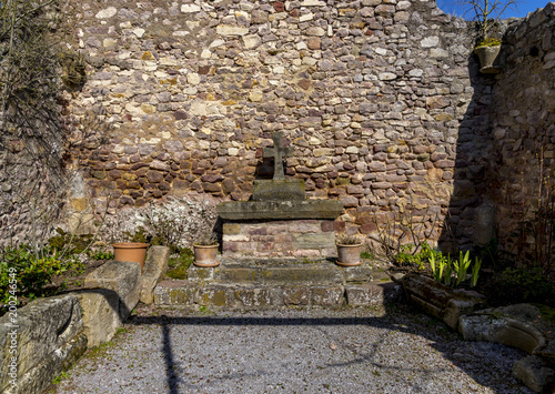 Chapel ruin with altar. Altenbaumburg Castle is the ruin of a spur castle on a ridge above Altenbamberg in Alsenz Valley in Rhineland-Palatinate, Germany photo