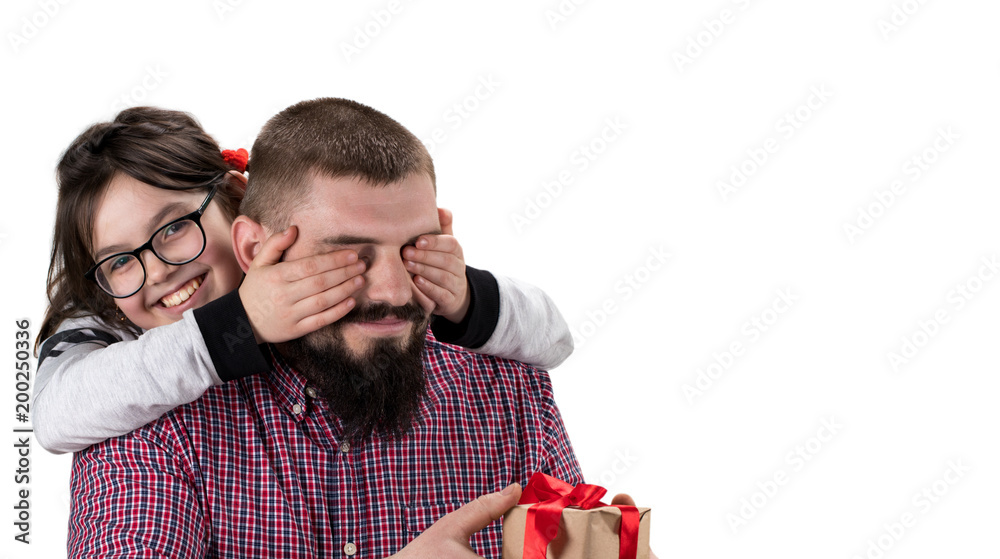 daughter making a gift to her father isolated on white background with copy space. Concept of Father's Day daughter making a gift to her father isolated on white background with copy space. Concept of Father's Day