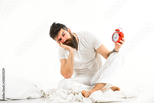 Hipster with beard and mustache overslept. photo