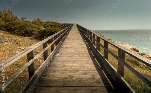 Wooden pathway on beach