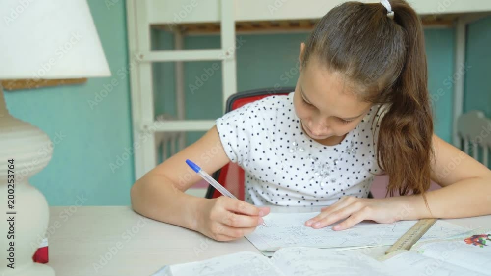 Difficulties in homework. Stressed girl learning mathematics lessons. Difficulties in homework. Stressed girl learning mathematics lessons.