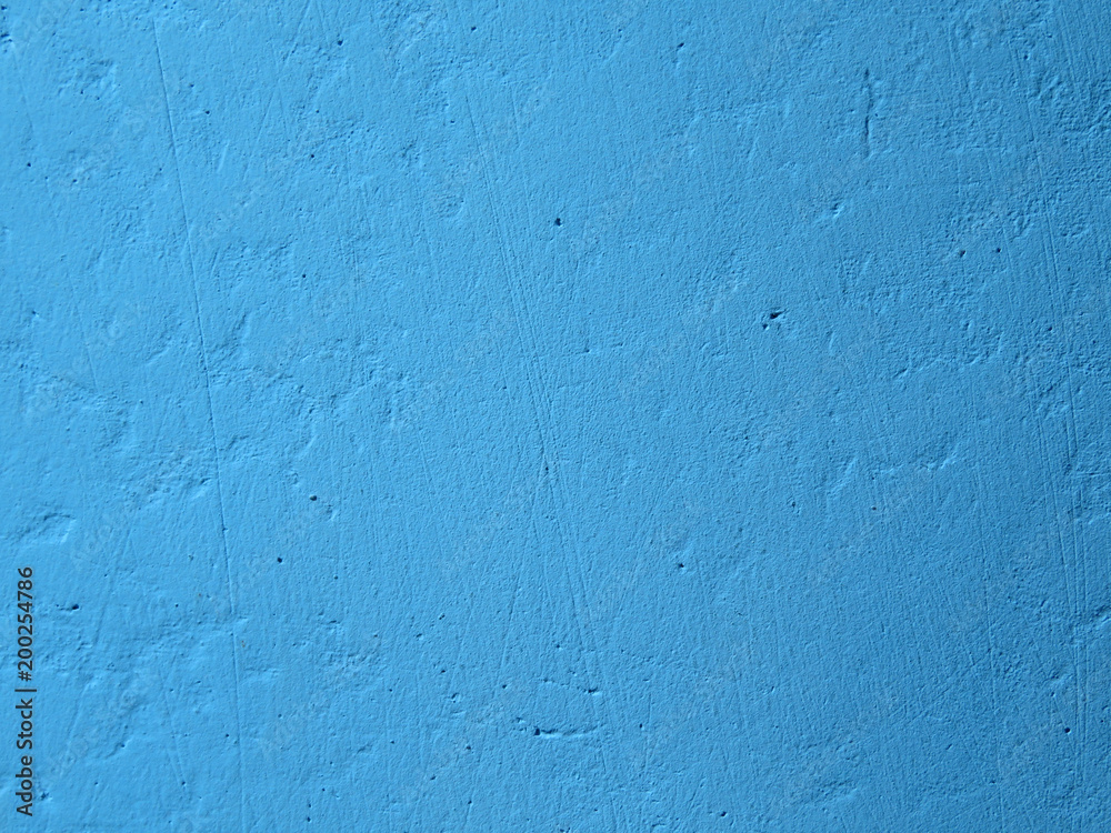 Fototapeta premium Blue concrete wall texture. Painted rough background