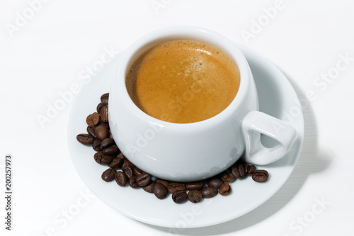morning cup of espresso on a white background, top view