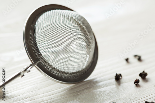 Traditional Chinese red, black tea and brew sieve photo