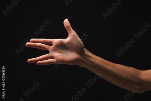 Man hand gesturing in the form of crocodile
