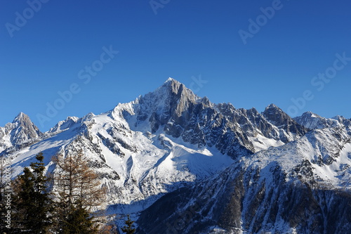 France. The tops of the Alps in the evening in the village Chamonix