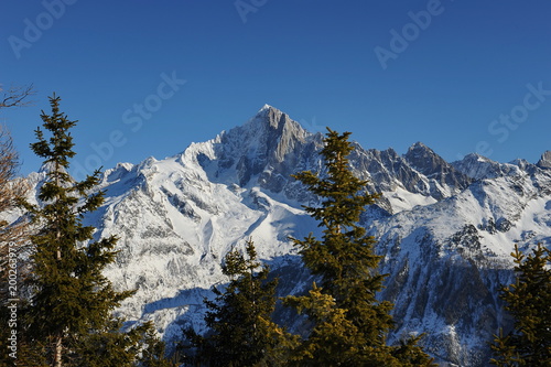 France. The tops of the Alps in the evening in the village Chamonix