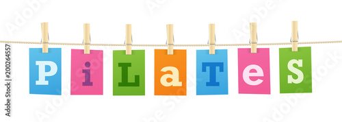 PILATES letters pinned to string with pegs