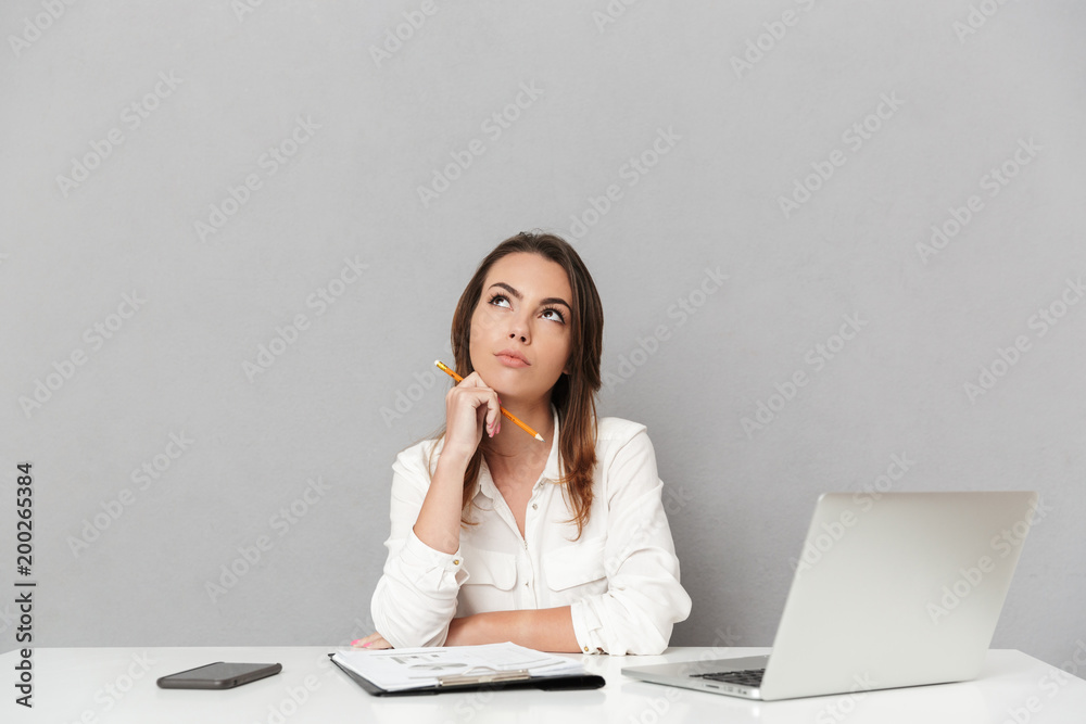 Portrait of a pensive young business woman Portrait of a pensive young business woman