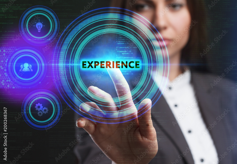 The concept of business, technology, the Internet and the network. A young entrepreneur working on a virtual screen of the future and sees the inscription: Experience The concept of business, technology, the Internet and the network. A young entrepreneur working on a virtual screen of the future and sees the inscription: Experience
