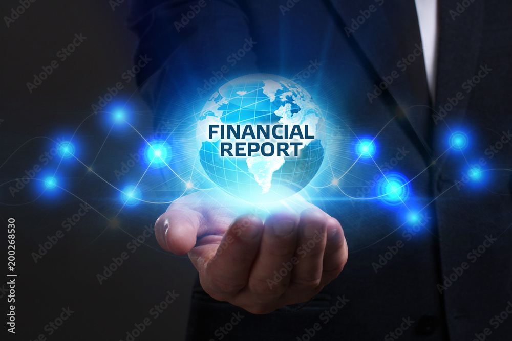 Business, Technology, Internet and network concept. Young businessman working on a virtual screen of the future and sees the inscription: Financial report