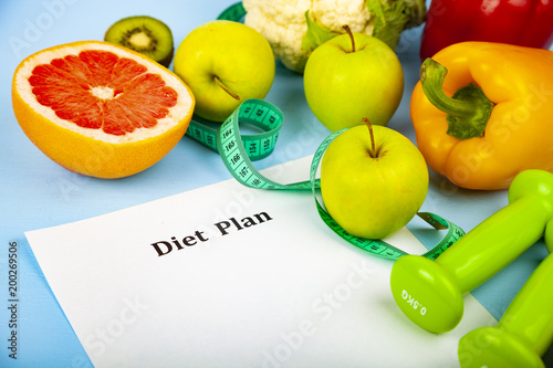 Food and sheet of paper with a diet plan