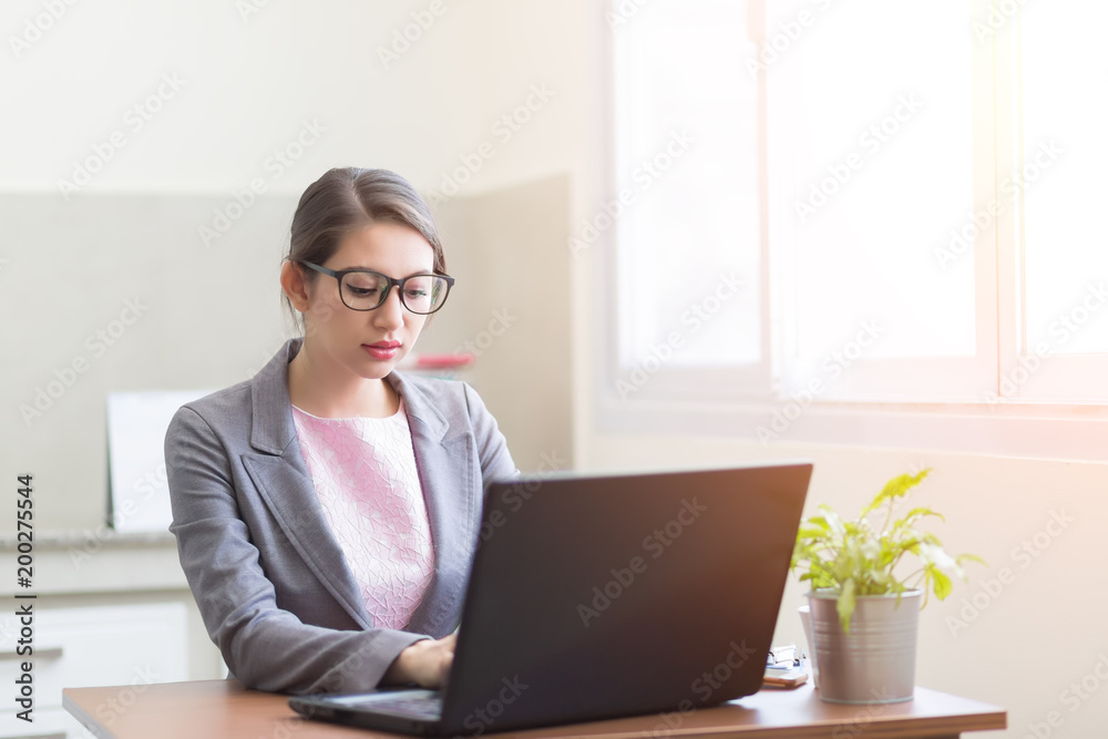 Young business entrepreneur working with big data analysis on smart computer at home office. startup small businesses entrepreneur and freelance concept. Young business entrepreneur working with big data analysis on smart computer at home office. startup small businesses entrepreneur and freelance concept.