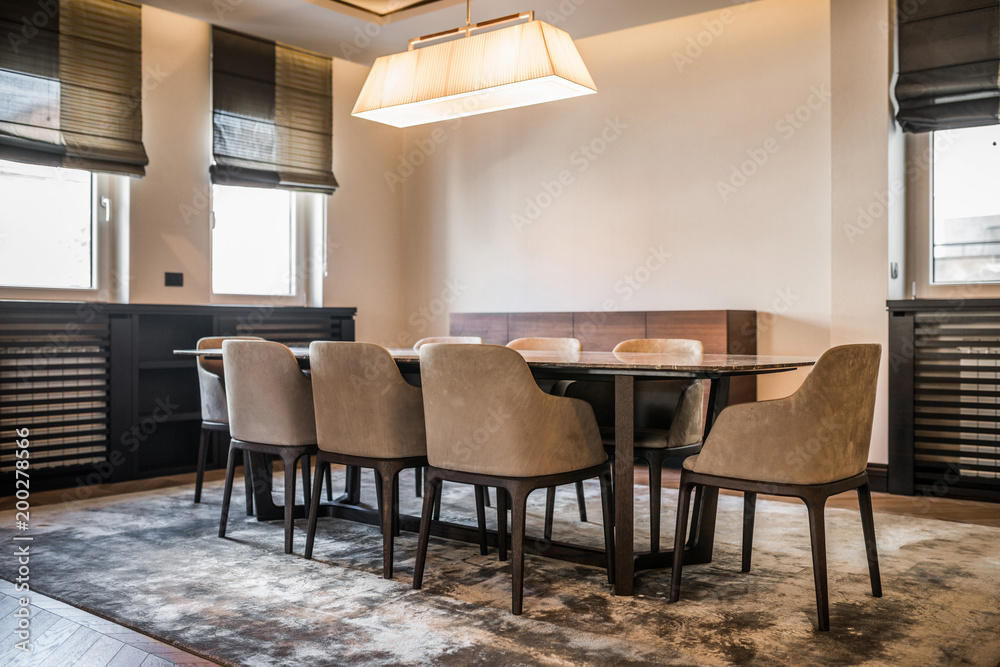 Open plan apartment interior, kitchen and dining area