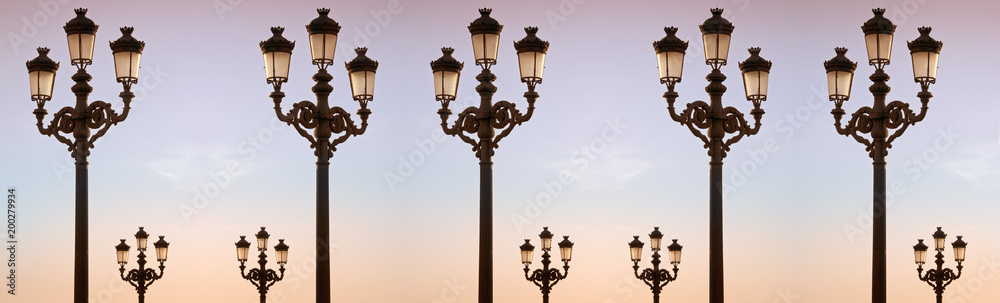 Street lanterns at dusk.