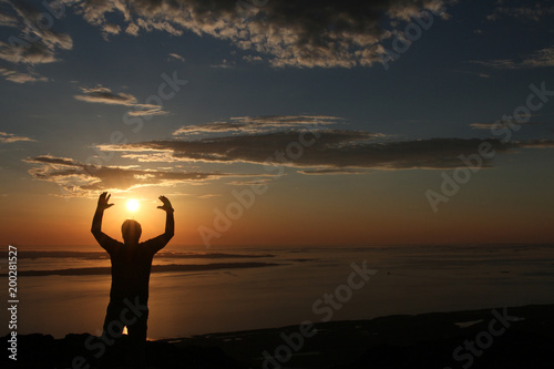 Man silhouette in sunset in from Mo mountain, Northern Norway