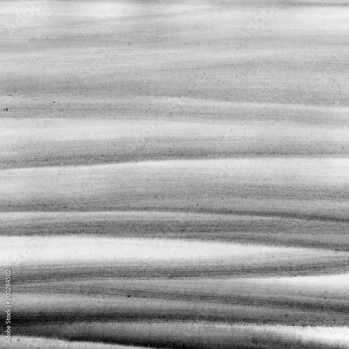 Black and white stripes background. Hand painted waves.