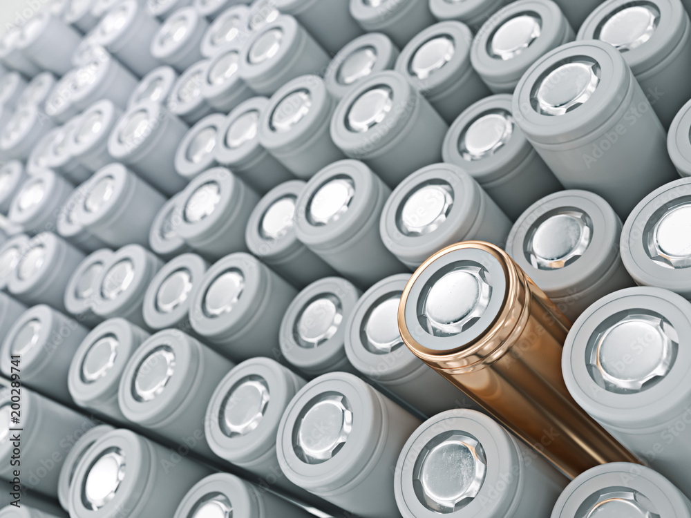 Closeup of gold pile of li-ion batteries. Close up colorful rows of selection of 18650 batteries energy abstract background of colorful batteries. 3d render