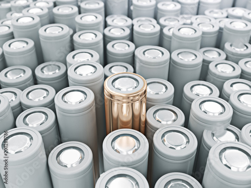 Closeup of gold pile of li-ion batteries. Close up colorful rows of selection of 18650 batteries energy abstract background of colorful batteries. 3d render