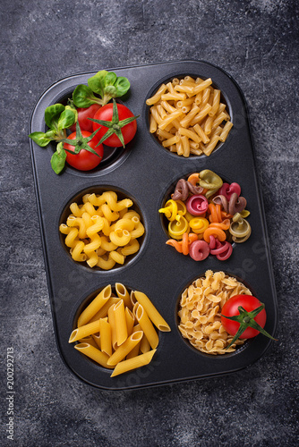 Various type of pasta and cherry tomato