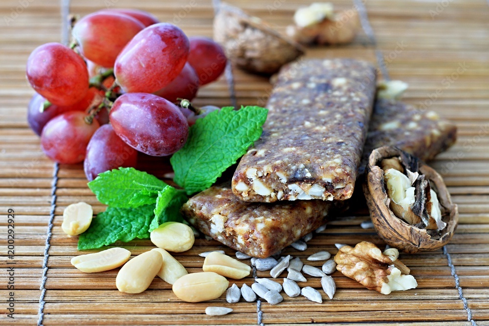 Fototapeta premium muesli bar with nuts sitting on the table