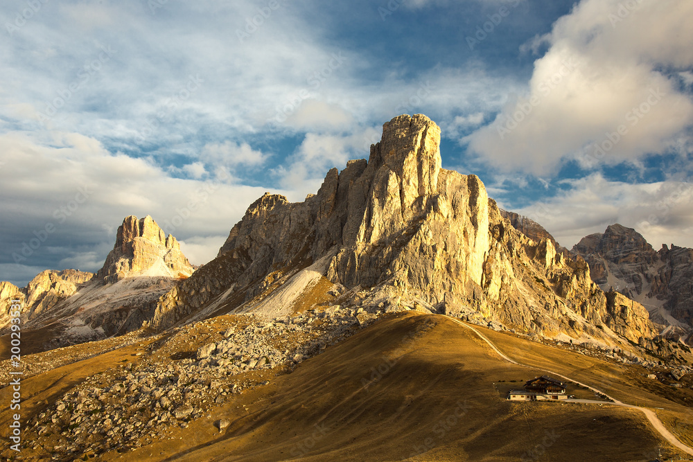 ine Mountains Dolomites, Passo Giau, Italy - panoramic view in autumn morning colors