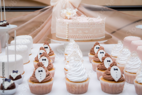 wedding candy bar cap cakes white brown. photo