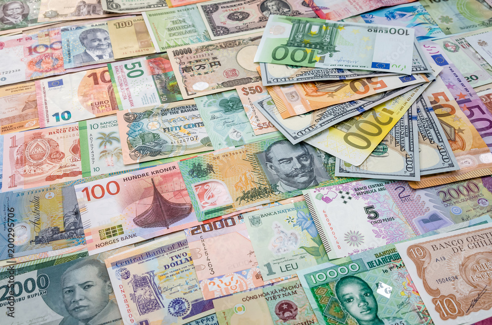 Euro and dollar banknotes on world money collection