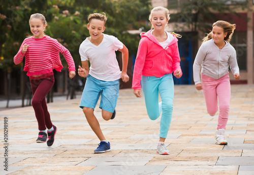 Children jogging in park