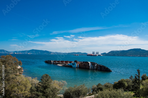 Mediterranean sky shipwreck formerly known as City of York sunken and abandoned at the bay of Eleusina, Attica, Greece 