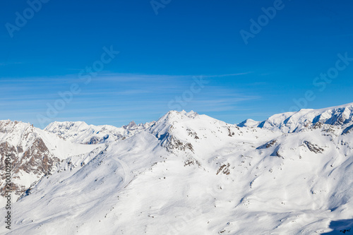 Winter panorama of snowy mountain ridge in 3 Valleys skiing  snowboard resort  Alps  France
