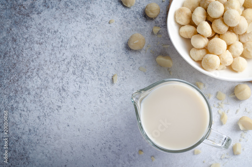 Macadamia milk on a light stone table