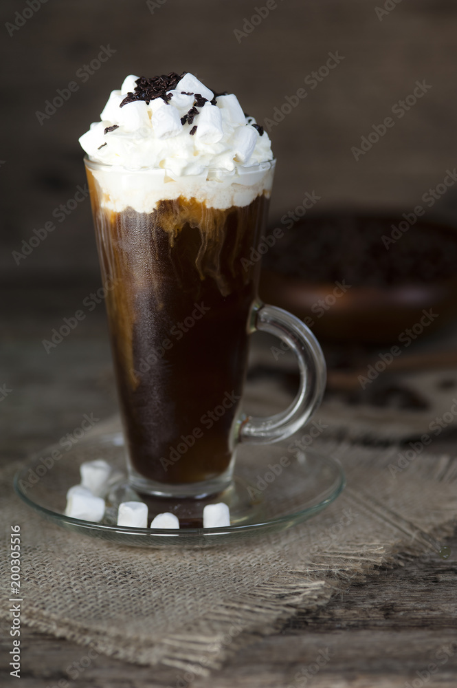 Iced coffee with ice cream, whipped cream and marshmallows Iced coffee with ice cream, whipped cream and marshmallows