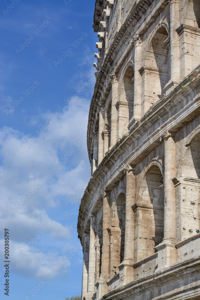 Fototapeta premium Part of a wall of the Colosseum and sky