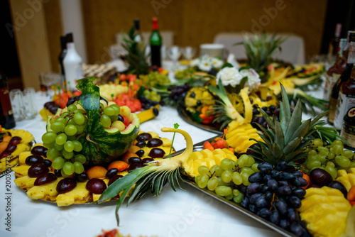 variety of juicy and tasty fruits on the wedding buffet table