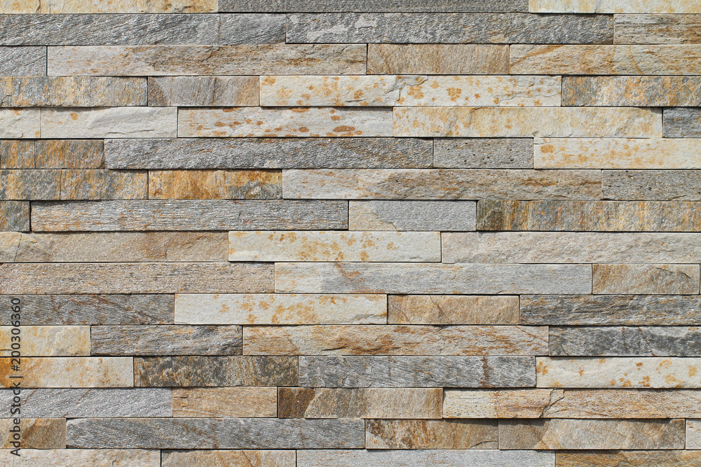 Obraz premium Natural shale. A sample of the wall covering with natural stone. Background.