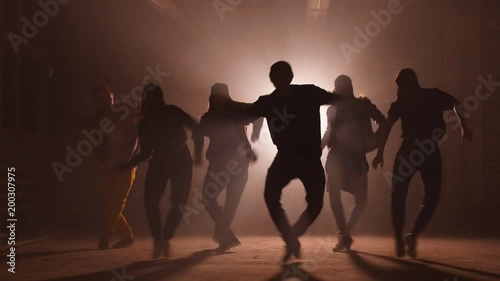 Six Caucasian rappers are performing on the street. unforgettable presentation.