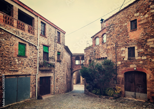 Old street in Catalan village. Pubol