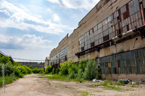 The abandoned old factory building outside 